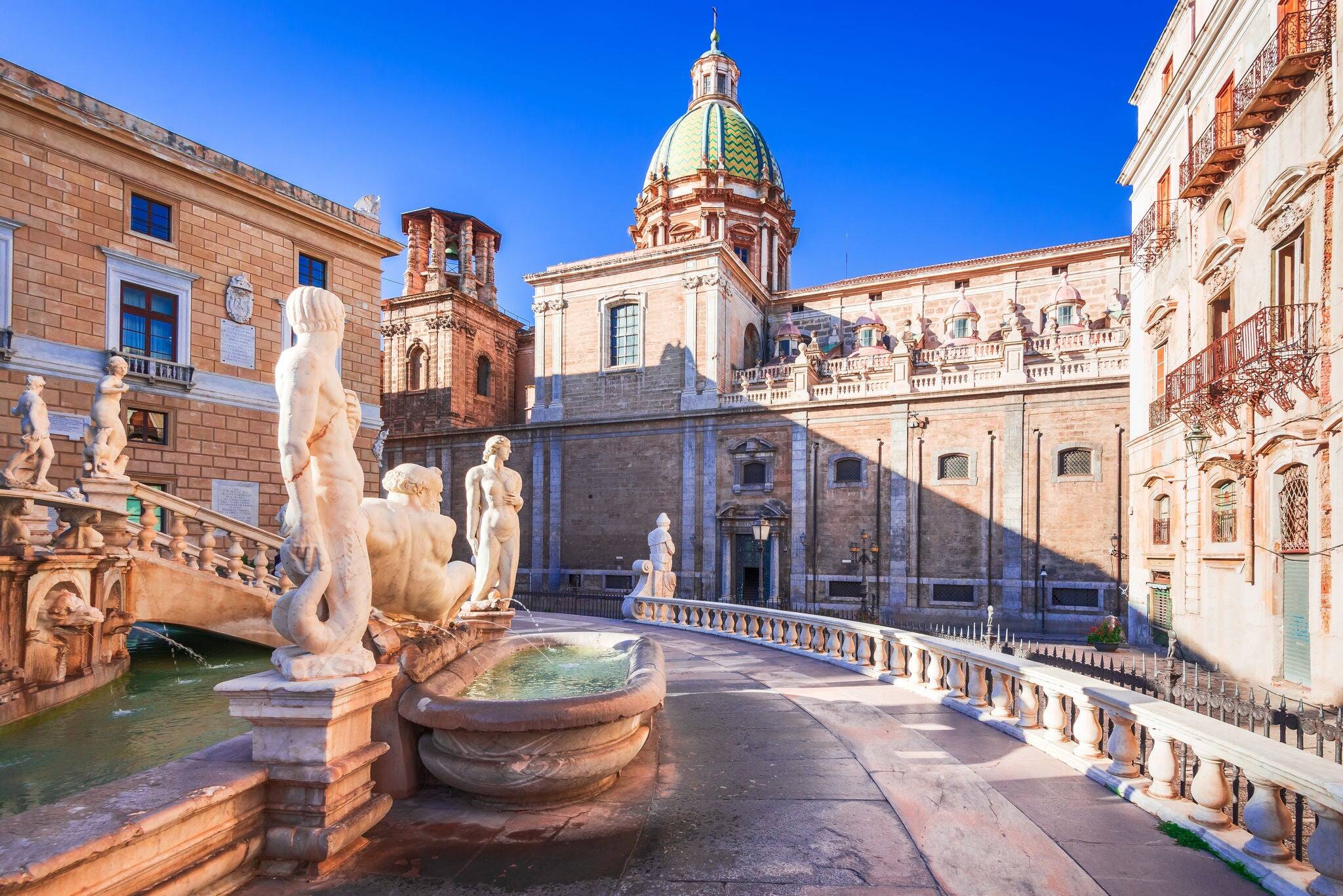 Palermo, Italy. Pretoria Fountain in Piazza Pretoria and Chiesa di San Giuseppe, Sicily travel spotlight.
