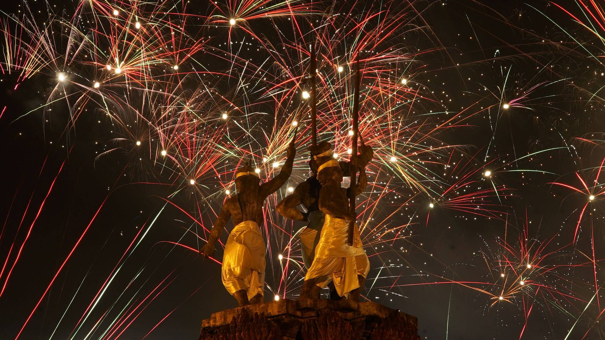 New Year's Eve at Puputan Badung Park, Denpasar Bali 2018. The monument of struggle looks gorgeous with fireworks adorning the night sky.