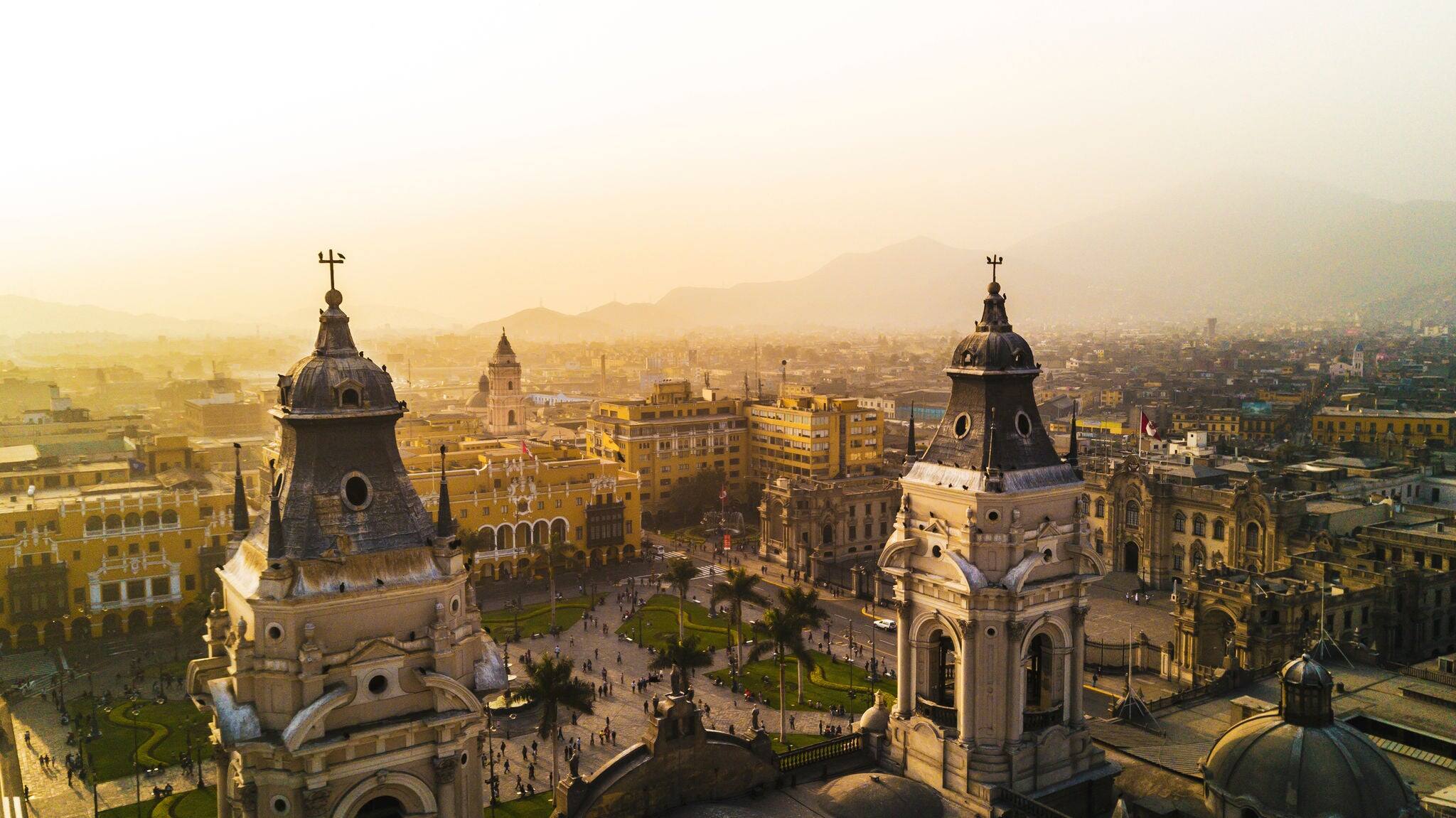 aerial view of a beautiful sunset from the square of arms of lima 2