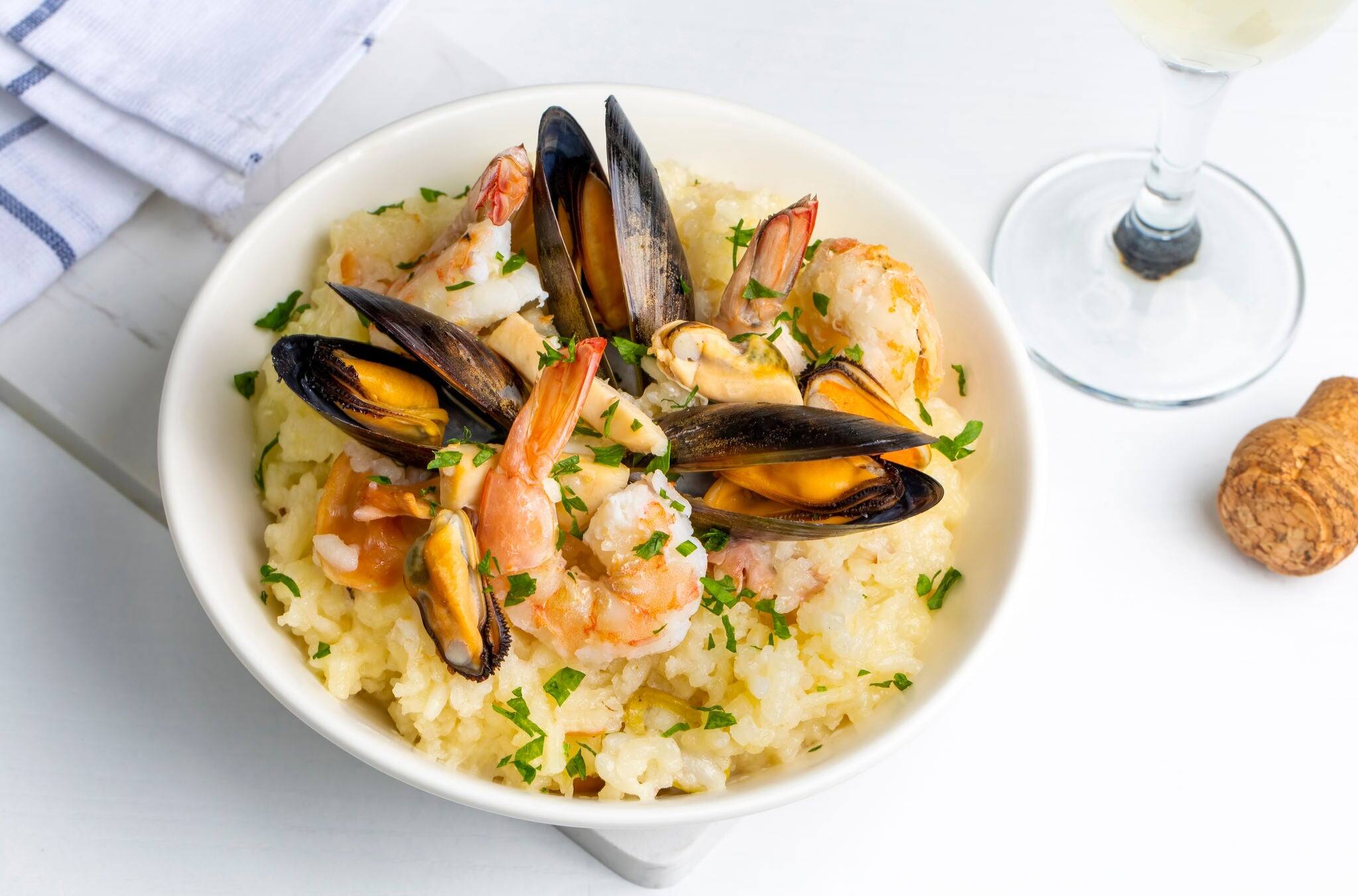 Mediterranean risotto with shrimps, mussels, octopus and clams. Seafood risotto