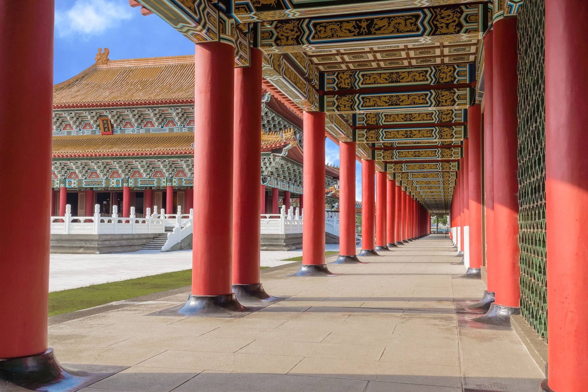 Perspective View of The Corridor of A Confucius Temple With The Main Temple Seen Between The Pillars.  A Typical Chinese Palace Architecture. A Tourist Site in Kaohsiung, Taiwan.