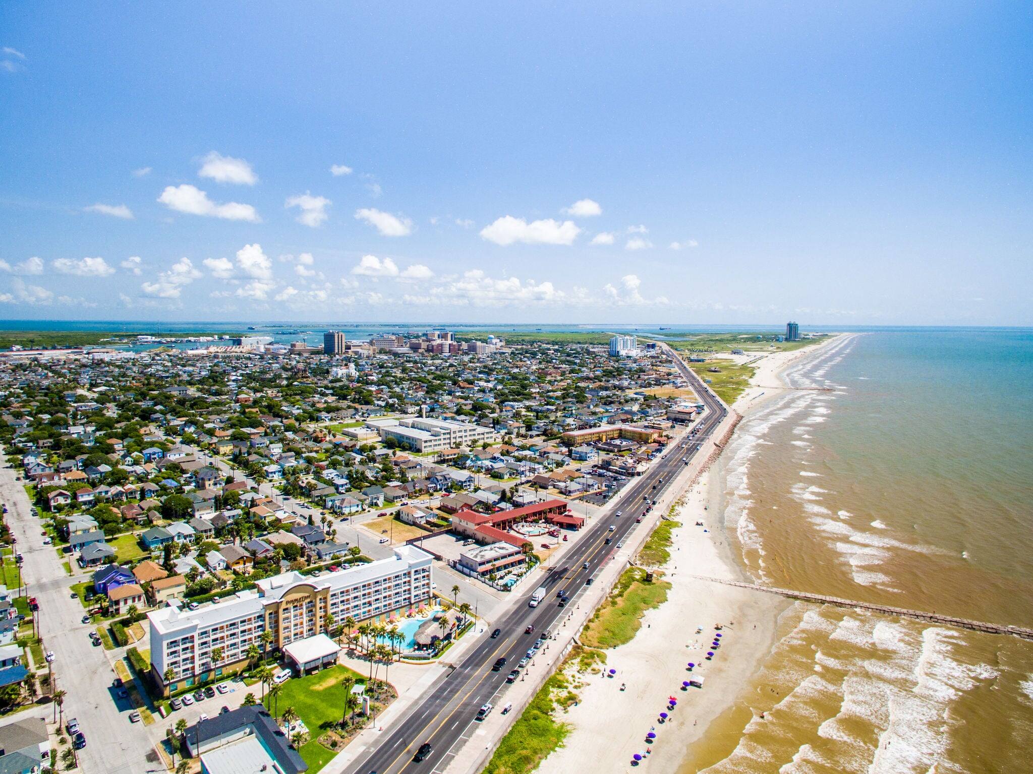 flying over Galveston Sea Wall and Beach