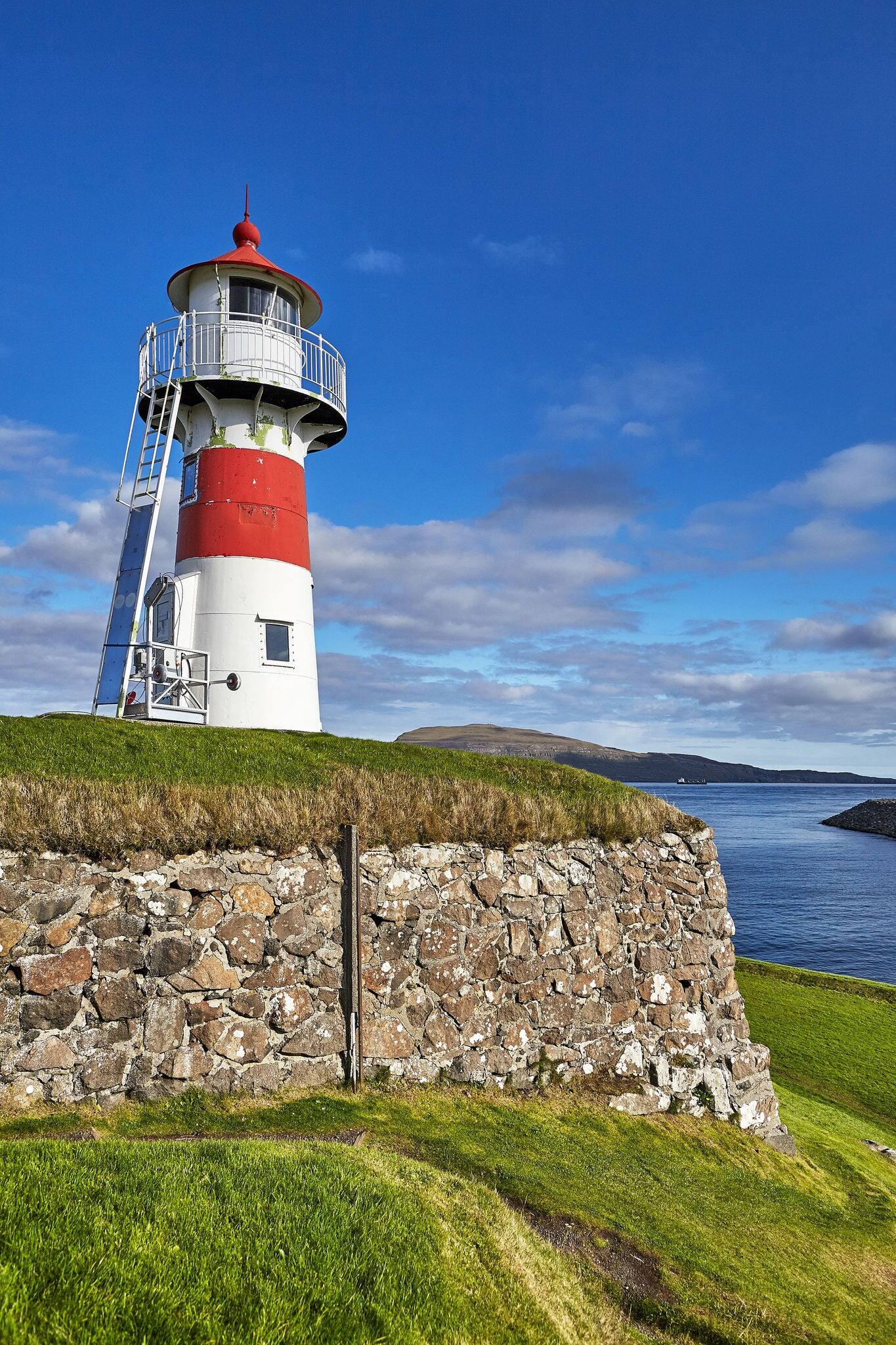 Historic maritime lighthouse in the fortress in the capital Torshavn