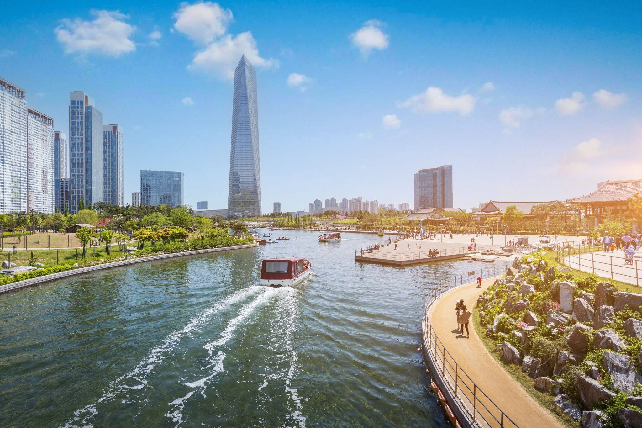 People are riding a tourist boat in summer of Korea at Central Park in Songdo District, Incheon South Korea.