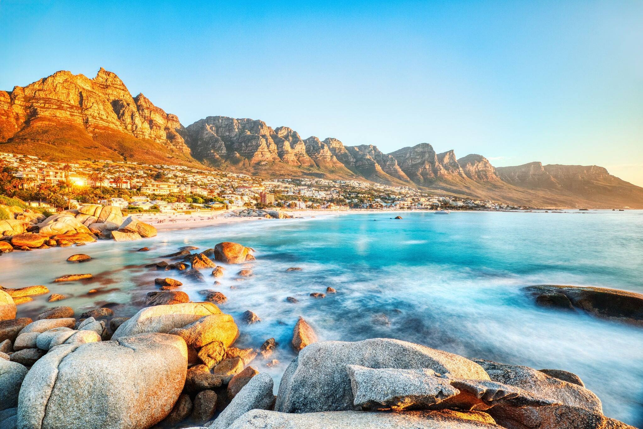 Cape Town Sunset over Camps Bay Beach with Table Mountain and Twelve Apostles in the Background, South Africa