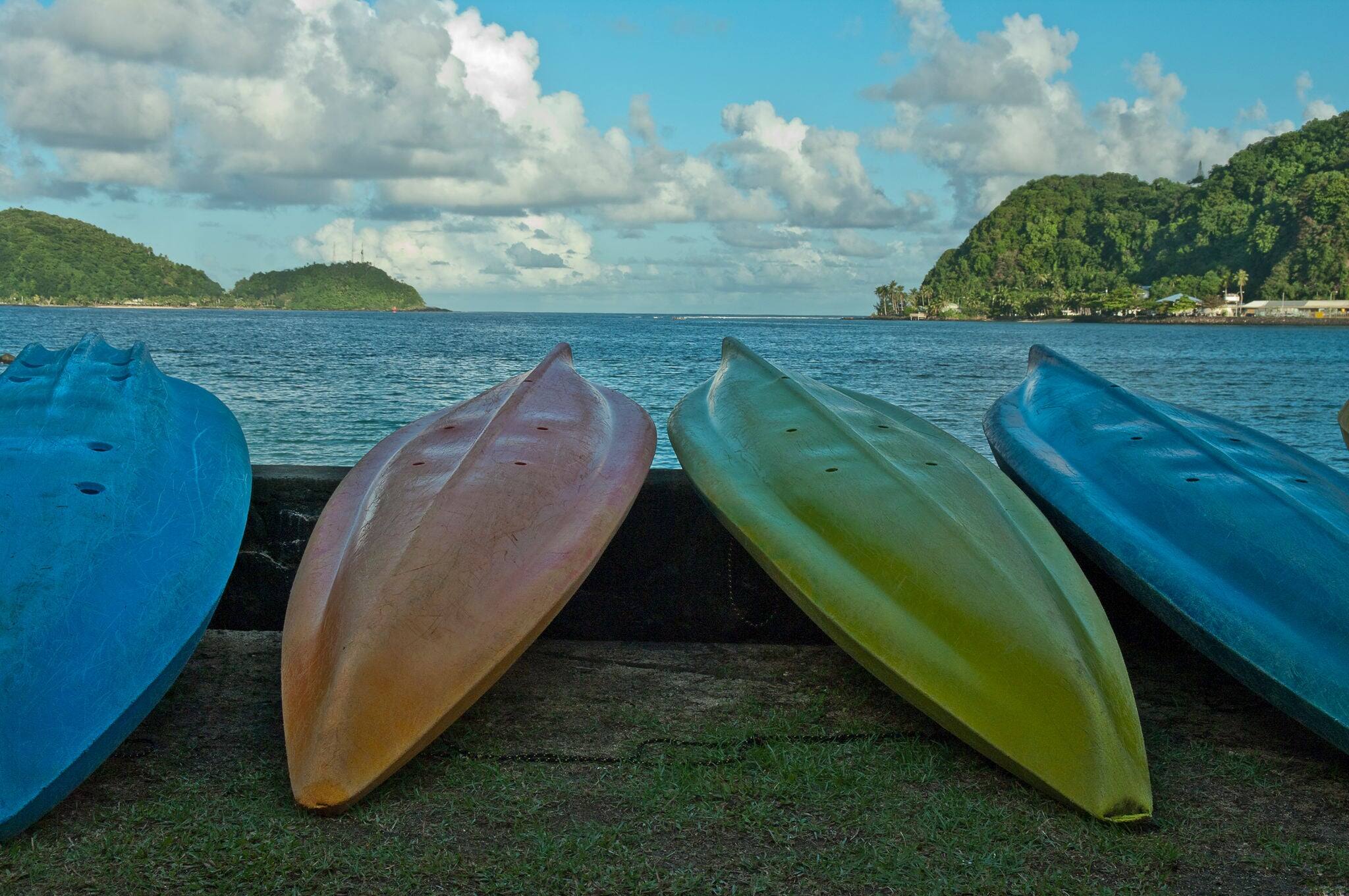 Colorful canoes on the beach in Pago Pago, Tutuila, American Samoa.