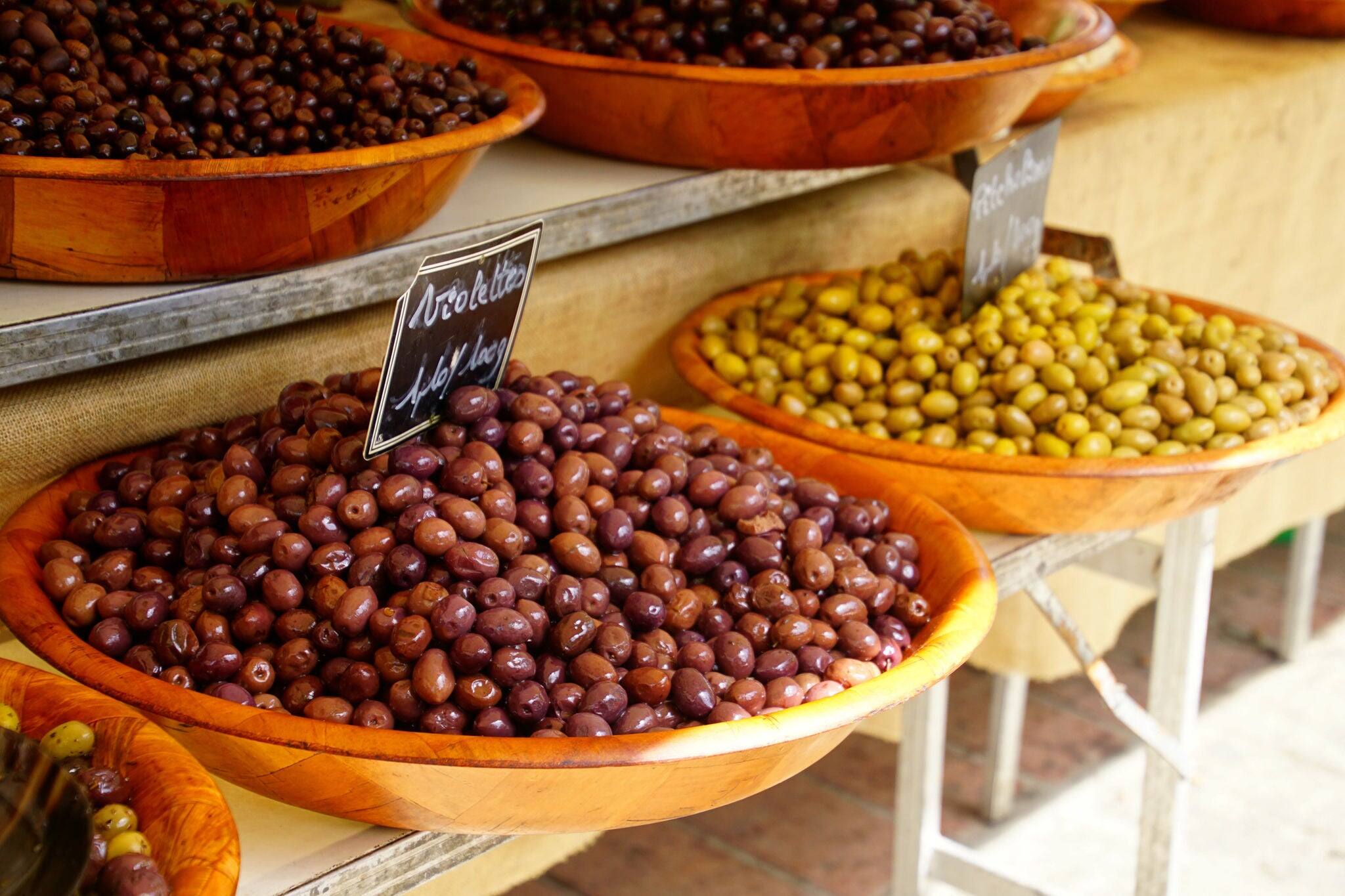 Olives for sale at a market in Ajaccio Corsica, France