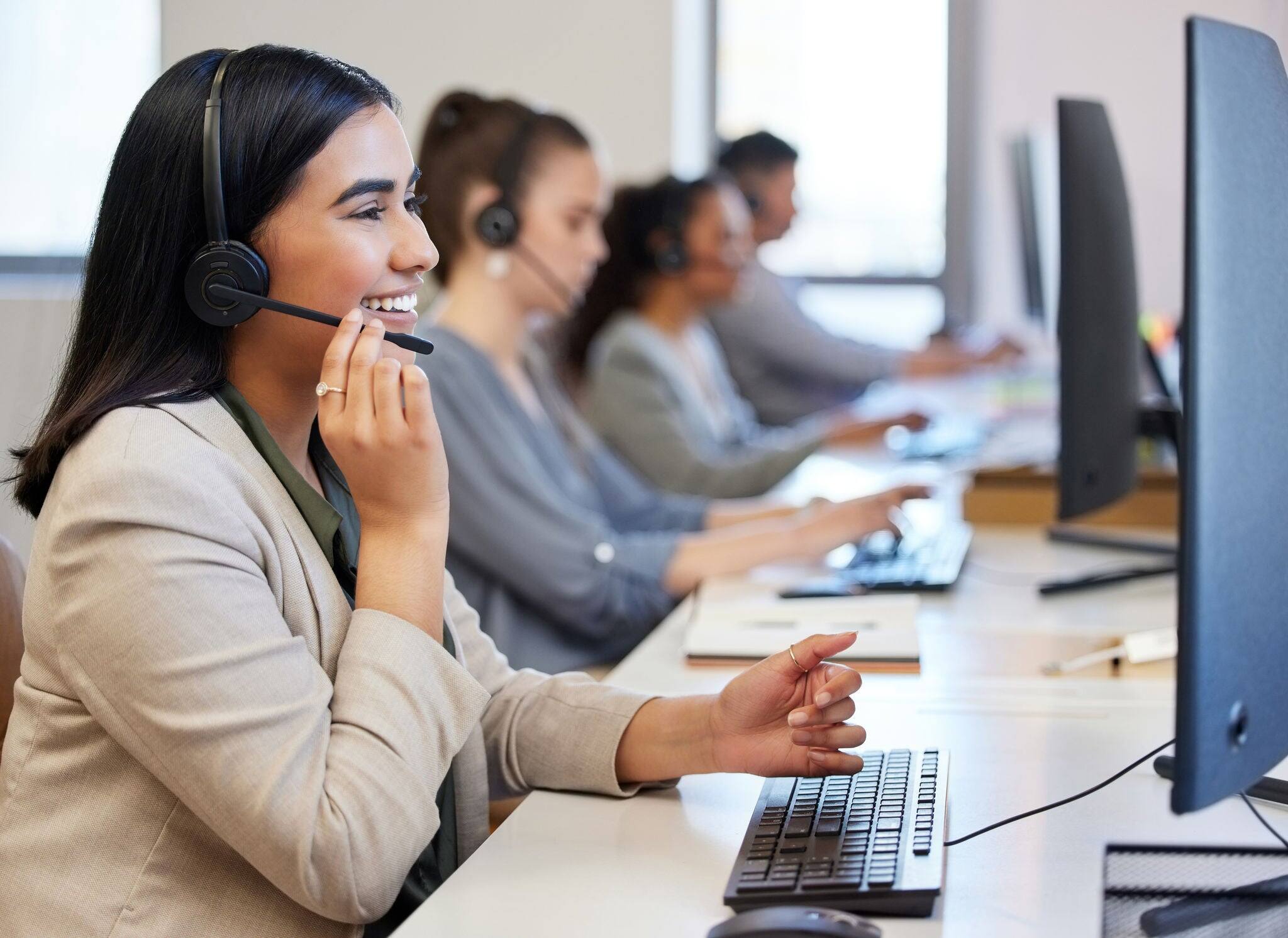Call center, profile and woman with headset, support and communication in office with pride. Happy, female person and telemarketing agent for deal, consulting and smile for customer service at desk