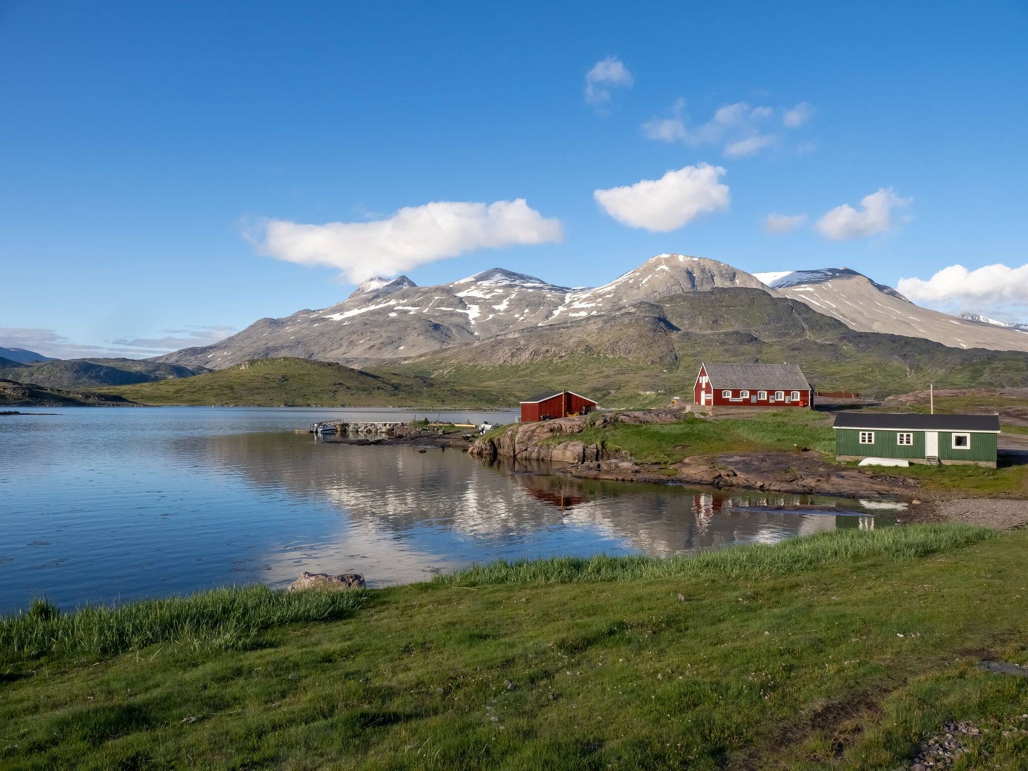 View of Igaliku in southern Greenland. A settlement with just a few dozen inhabitants. Famous for its Norse ruins of Garðar and its unique farming sites at the edge of the ice cap.