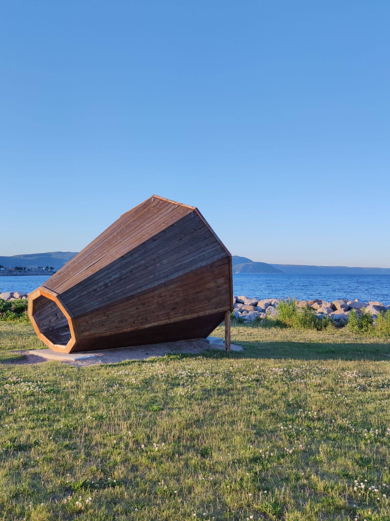 Late afternoon stroll at the Parc des Pionniers in Baie Comeau, in the North Shore region of Quebec Province, Canada, at sunset during a sunny summer day