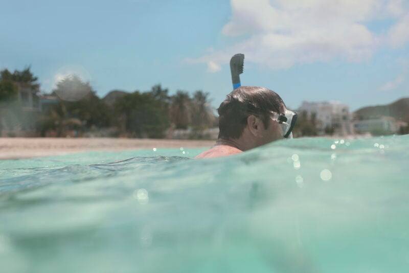 Snorkeling in clear waters.