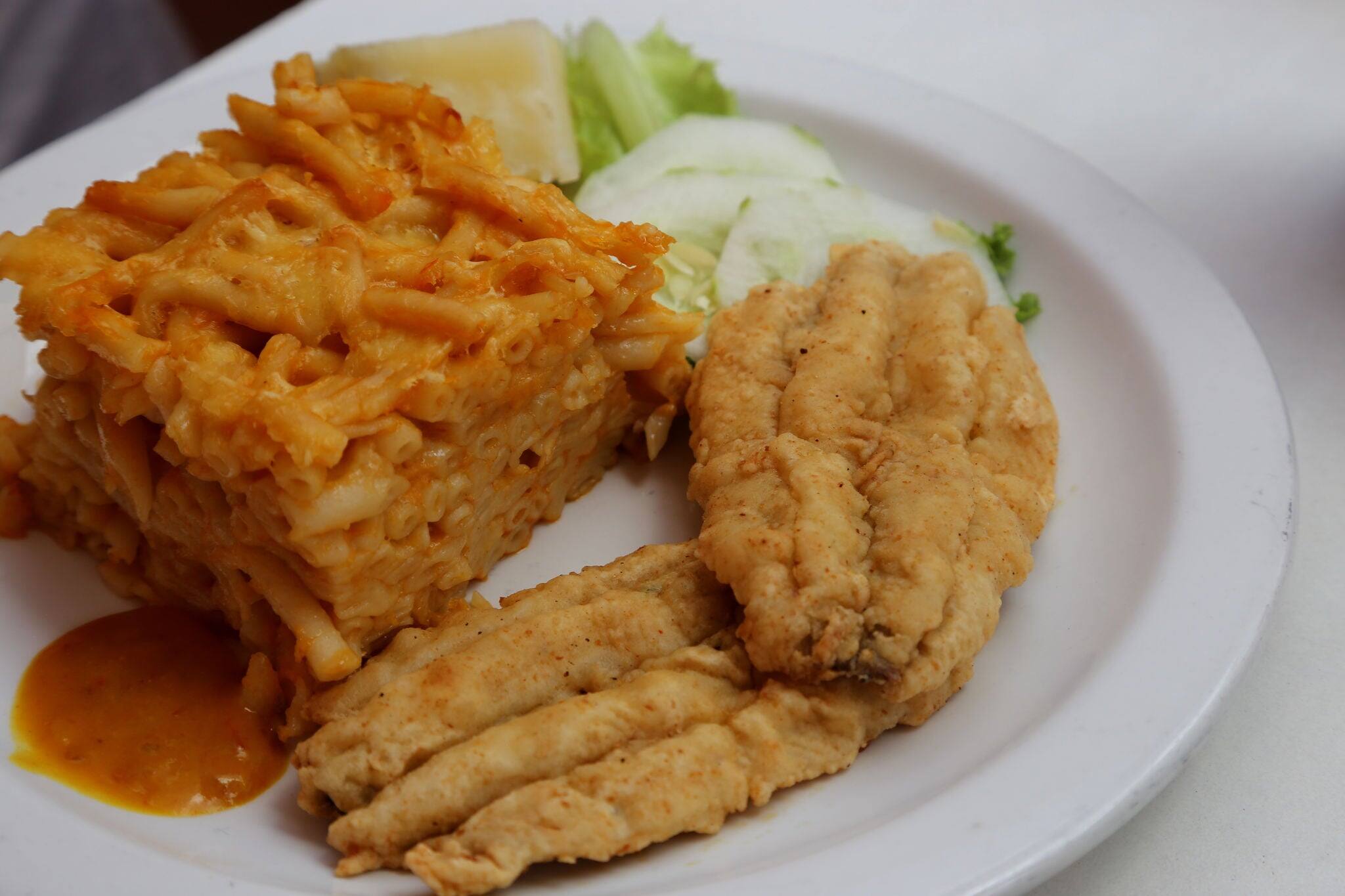 Plate of Bajan Fried Flying Fish with Macaroni Pie