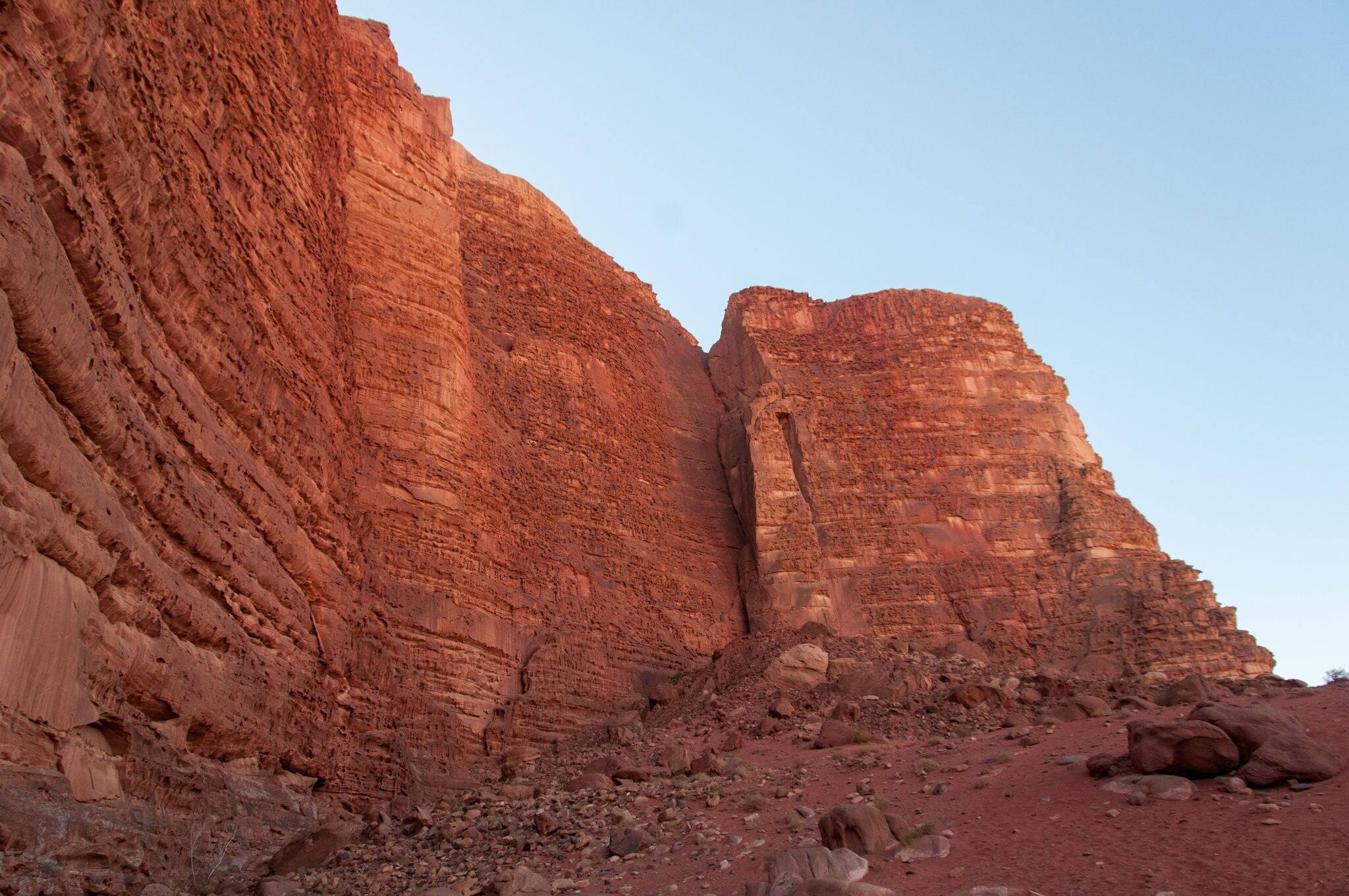 Wadi Rum also known as The Valley of the Moon. It is a valley cut into the sandstone and granite rock in southern Jordan 60 km to the east of Aqaba; it is the largest wadi in Jordan.