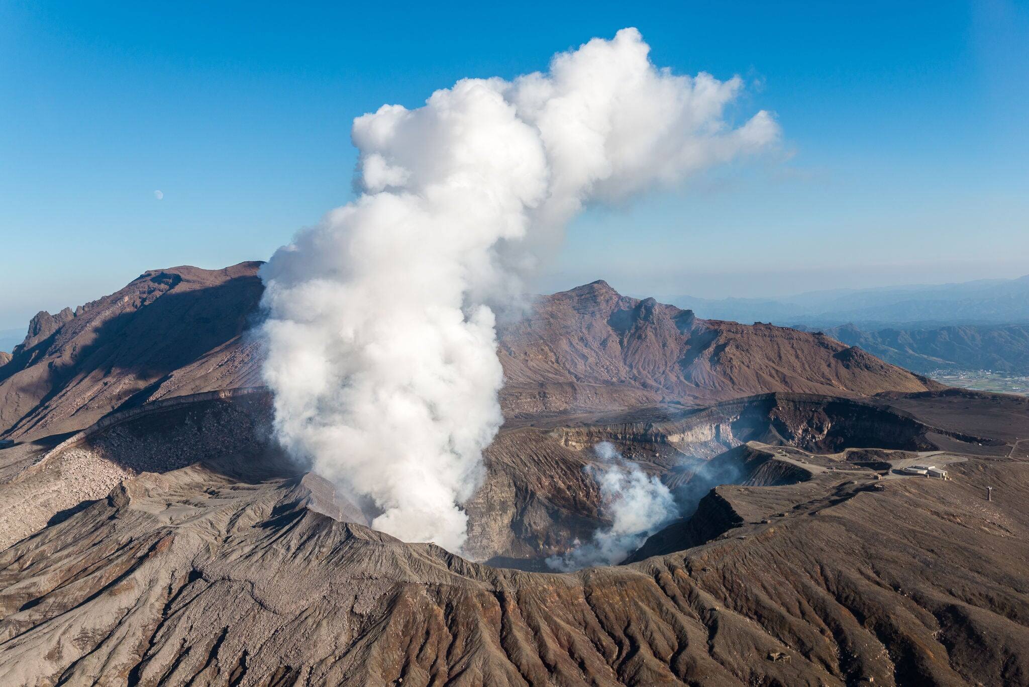 Volcano, Kyushu, Mount Aso, Beautiful Panorama Aerial View Smoke Gas Steam Crater Caldera largest active Volcano in Japan Island eruption under Sunny Clear Blue Sky in Summer Daytime, Kumamoto, Kyushu