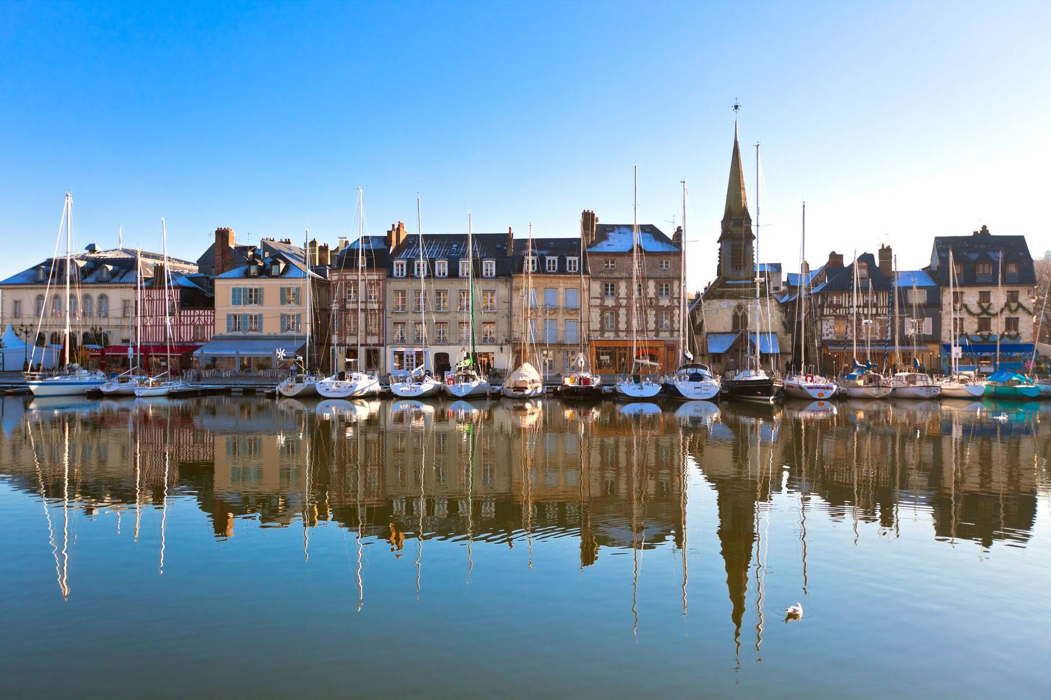 Honfleur harbour in Normandy, France. Old houses and their reflection in water. another Honfleur shots available