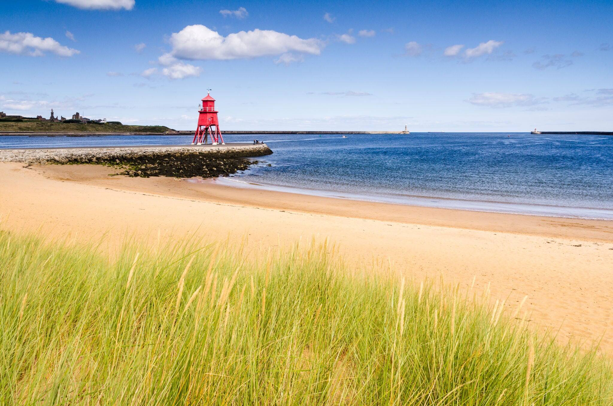 River Tyne beach at South Shields / The Groyne Lighthouse at South Shields sits in the mouth of the River Tyne to protect the beach and help with navigation
