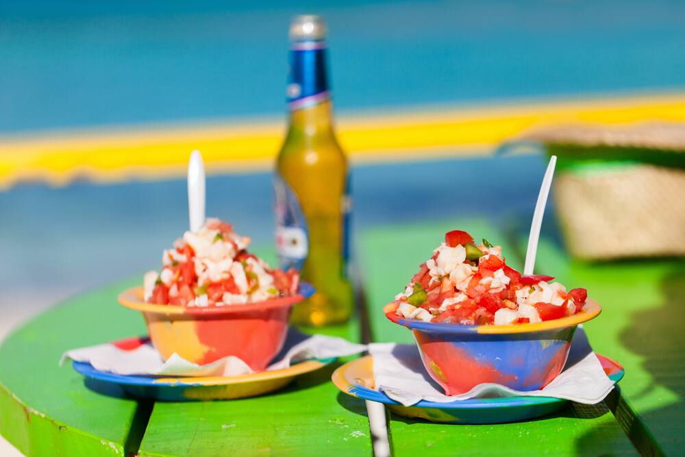 Kalik Beer & Conch Salad Try Kalik Beer on a Cruise to The Bahamas