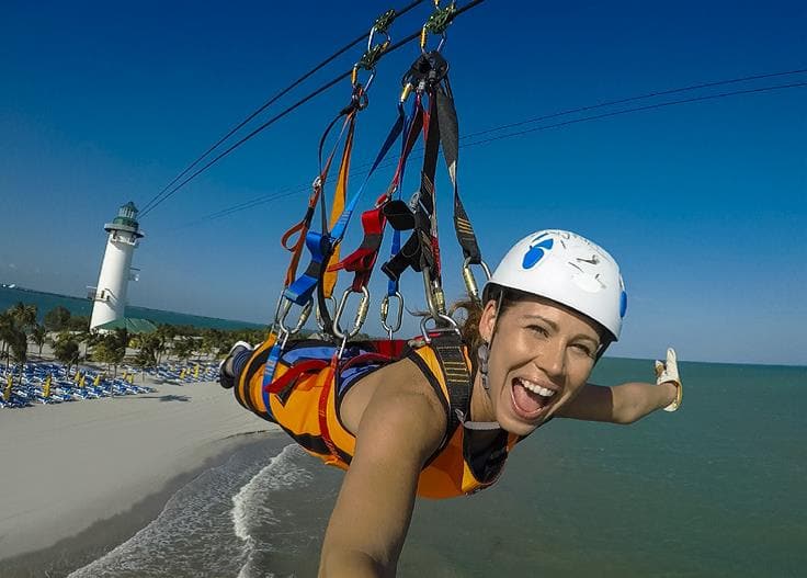 Find Excitement on a Zipline across Harvest Caye Find Excitement on a Zipline across Harvest Caye